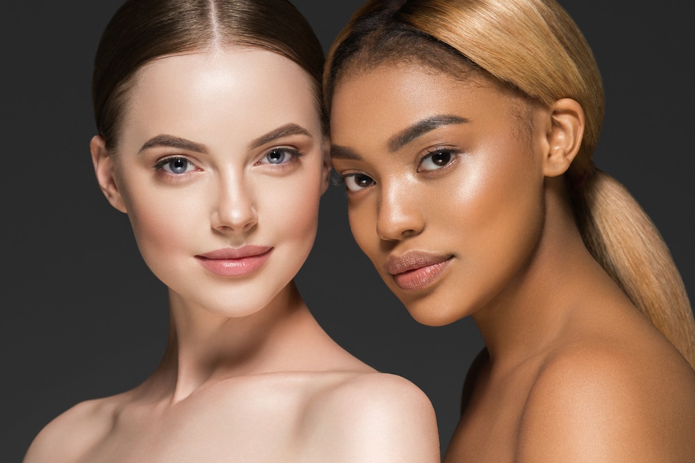 Two young women smiling