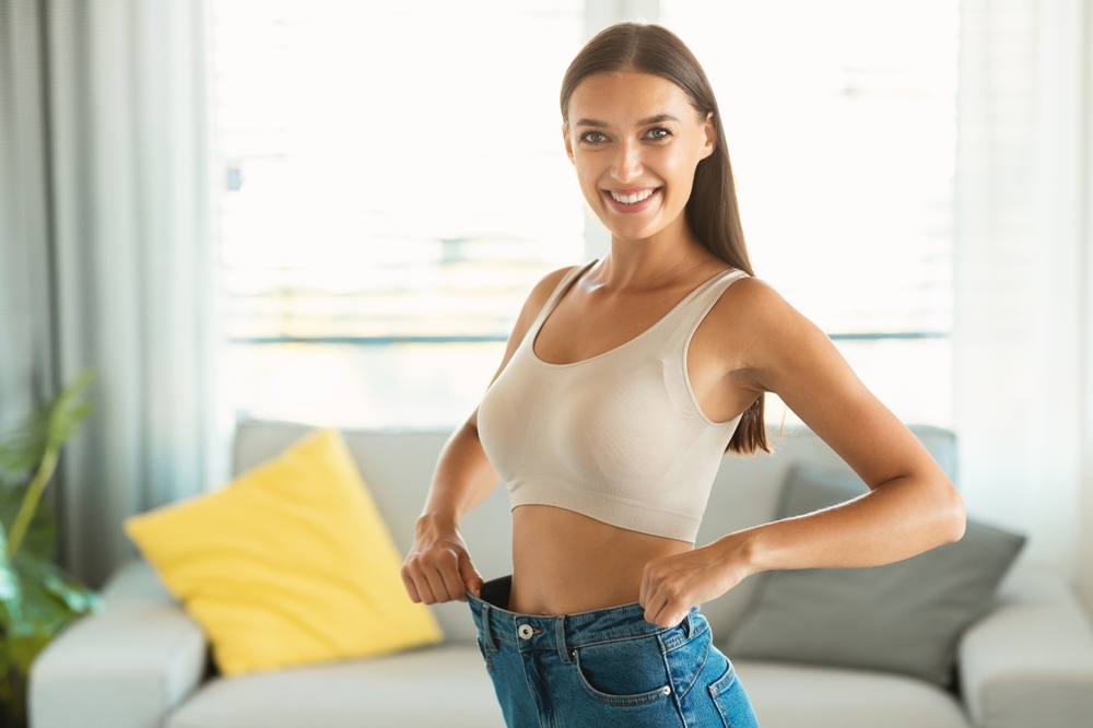 Woman after breast implants in Lone Tree, Co.