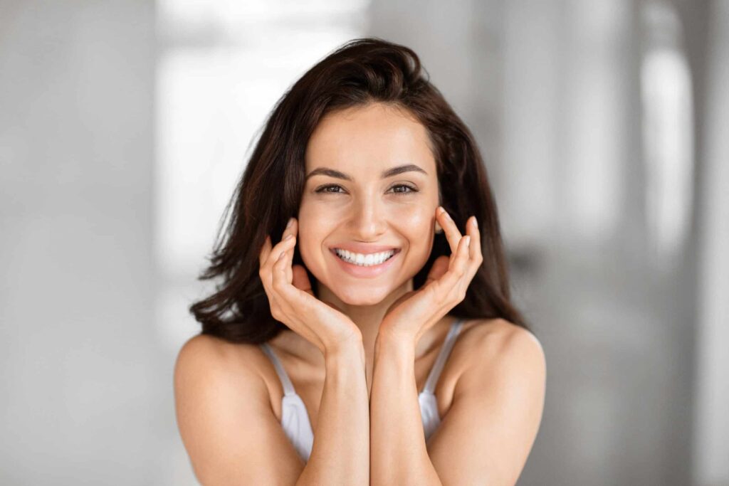 Beautiful young woman with glowing skin after lumecca ipl treatment